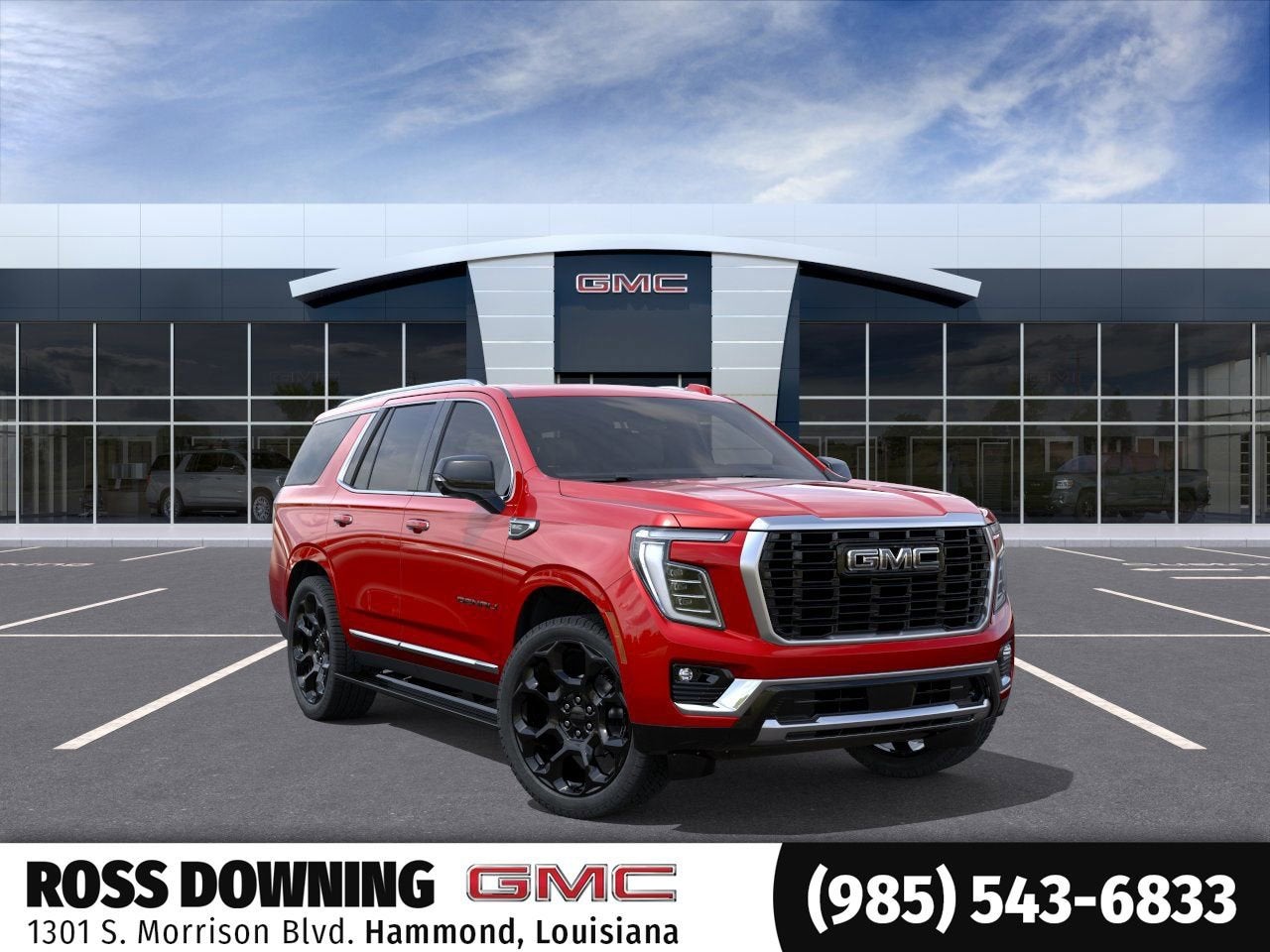 2026 GMC Yukon Denali in Volcanic Red Tintcoat — front three-quarter view