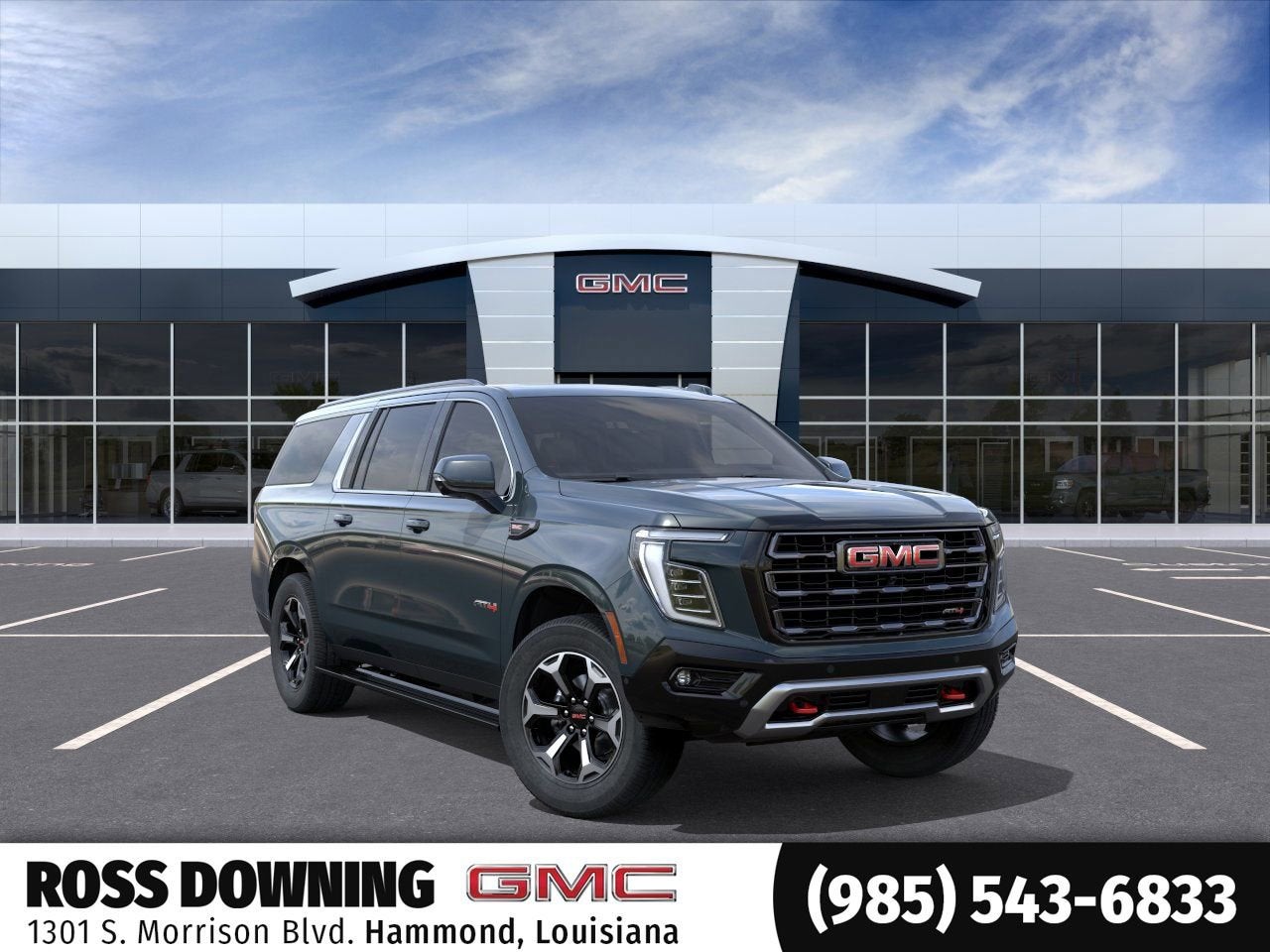 2026 GMC Yukon XL AT4 Ultimate in Midnight Pine — front three-quarter view