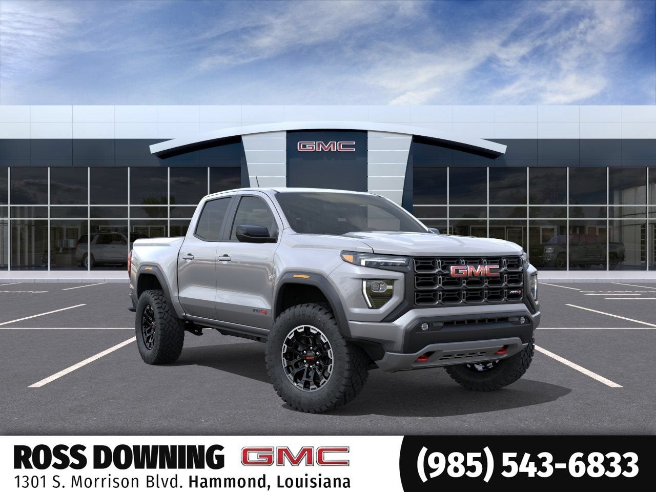 2026 GMC Canyon AT4 in Sterling Metallic — front three-quarter view