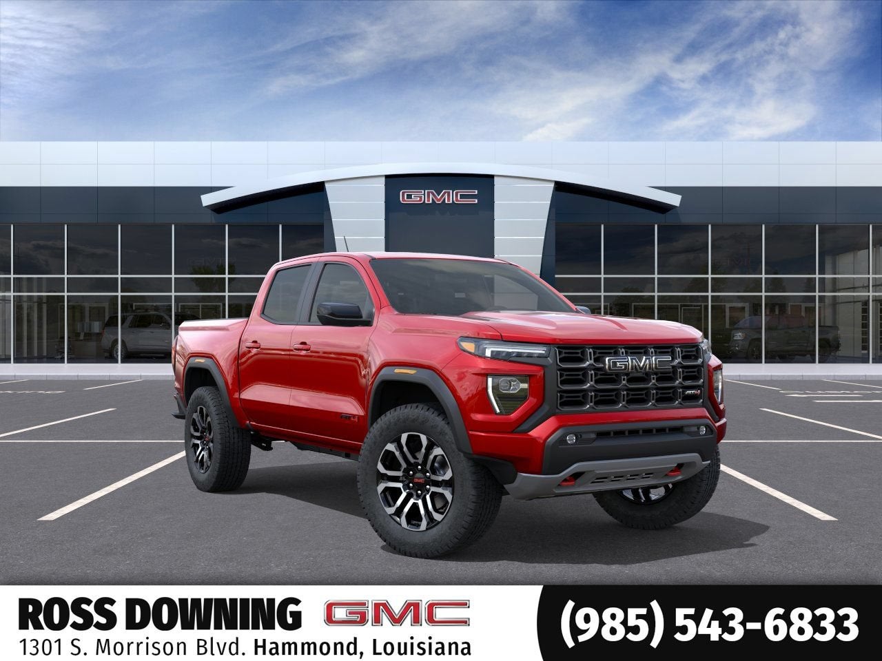 2026 GMC Canyon AT4 in Volcanic Red Tintcoat — front three-quarter view