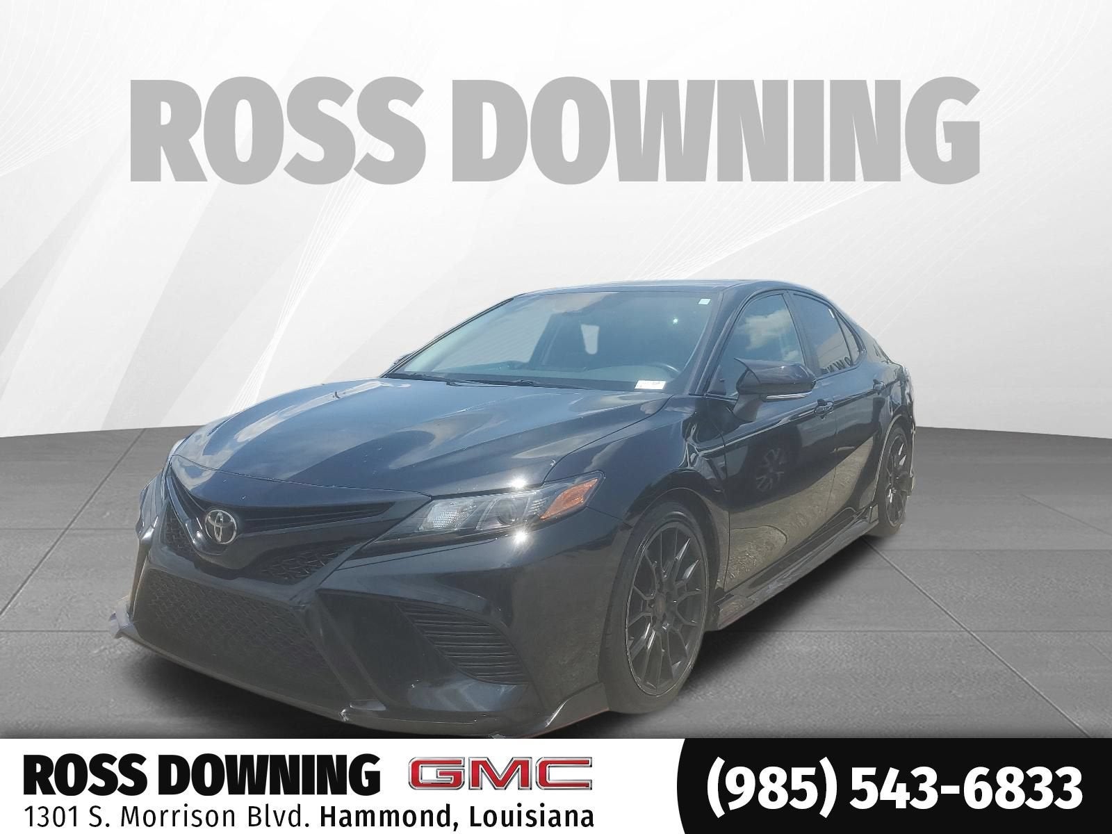 2021 Toyota Camry TRD in Black — front three-quarter view